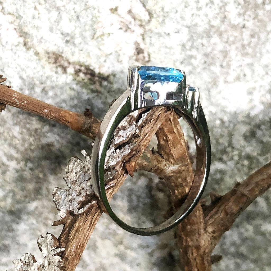 Trilliant Cut Blue Topaz With Blue Topaz Accent Ring