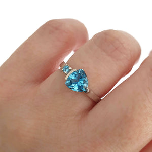 Trilliant Cut Blue Topaz With Blue Topaz Accent Ring