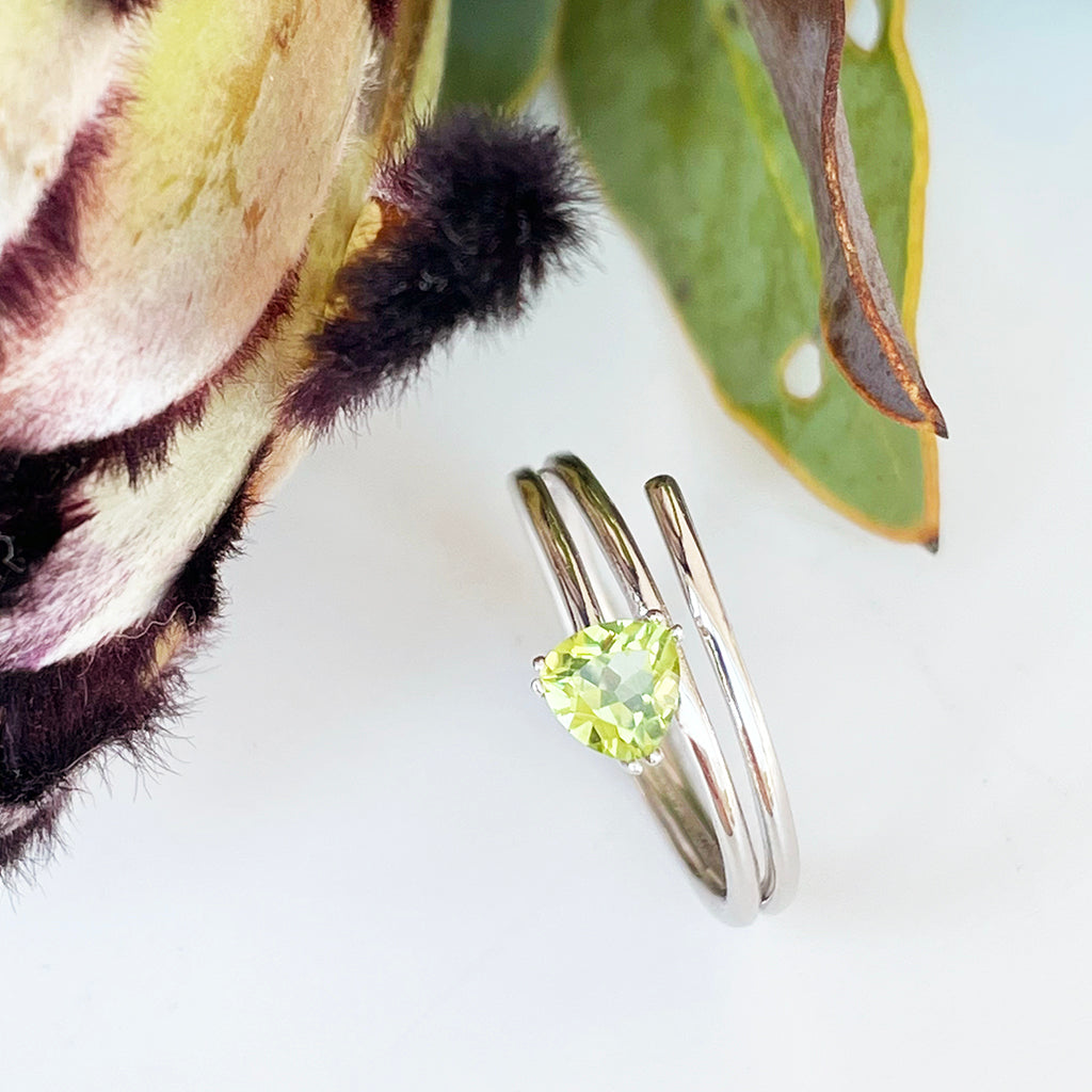 Trilliant Cut Peridot Silver Wrap Around Ring