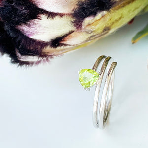 Trilliant Cut Peridot Silver Wrap Around Ring