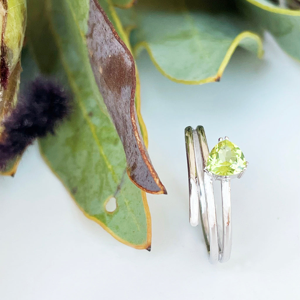 Trilliant Cut Peridot Silver Wrap Around Ring