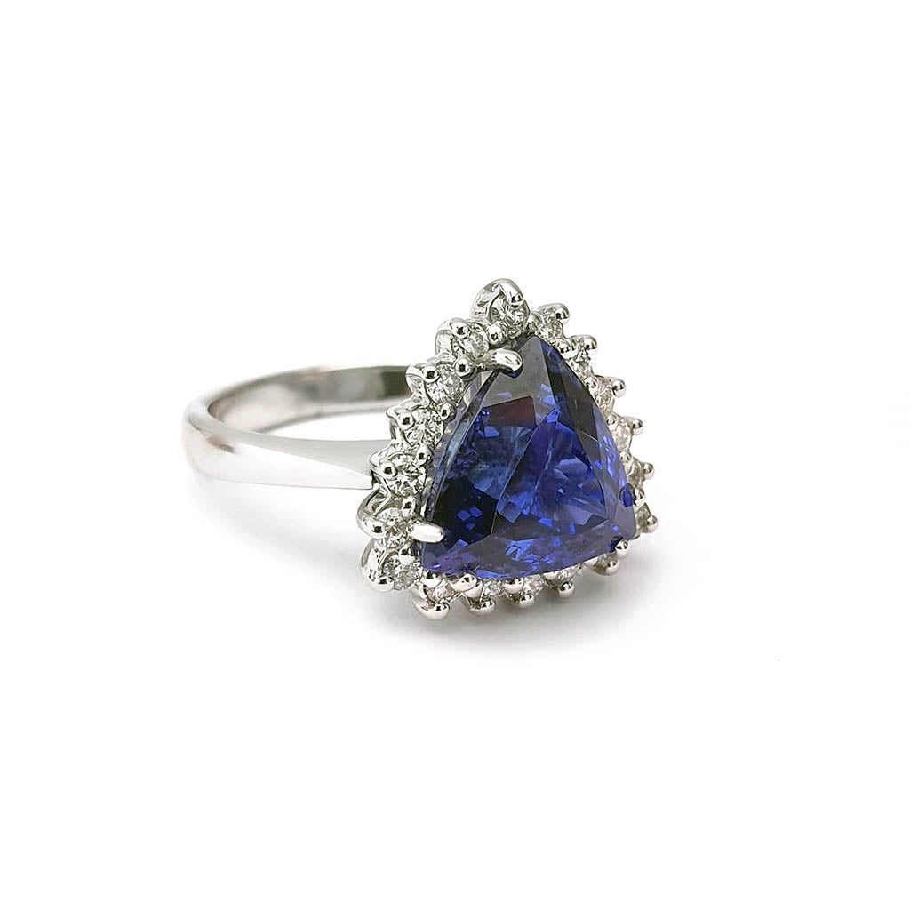 Trilliant Cut Tanzanite and Diamond Halo Ring