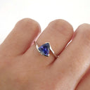 Trilliant Cut tanzanite with Twisted White Gold Band