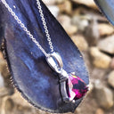 Trilliant Grape Garnet and Petit Diamond pendant