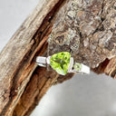 Trilliant Peridot with Round Peridot Highlight Ring