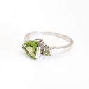 Trilliant Peridot with Round Peridot Highlight Ring