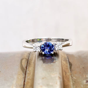 Trilogy Center Tanzanite Ring with White Diamond Accents