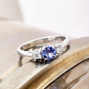 Trilogy Center Tanzanite Ring with White Diamond Accents