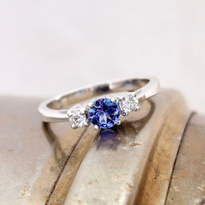 Trilogy Center Tanzanite Ring with White Diamond Accents