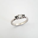Trilogy Center White Diamond Ring with Black Diamond Accents