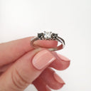 Trilogy Center White Diamond Ring with Black Diamond Accents