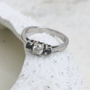 Trilogy Center White Diamond Ring with Black Diamond Accents