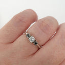 Trilogy Center White Diamond Ring with Black Diamond Accents