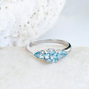 Trilogy Pear and Round Aquamarine Engagement Ring