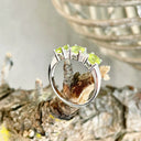 Trilogy Peridot Ring with Double Diamond Highlights