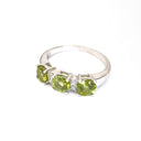 Trilogy Peridot Ring with Double Diamond Highlights