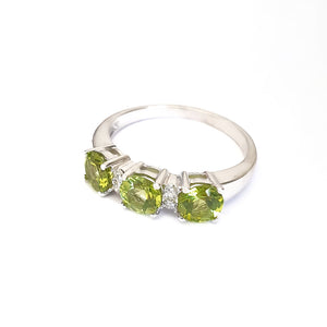 Trilogy Peridot Ring with Double Diamond Highlights