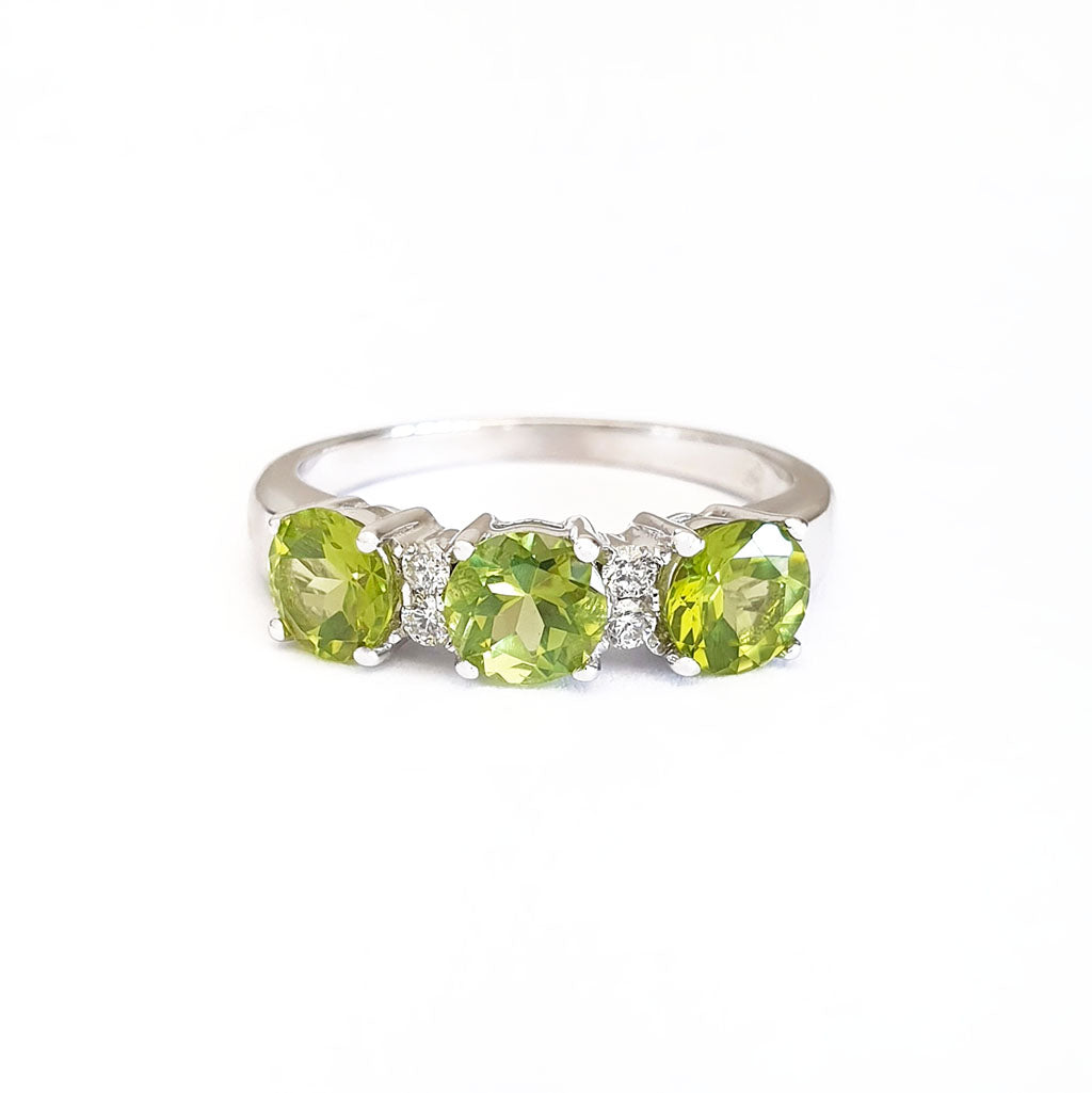Trilogy Peridot Ring with Double Diamond Highlights