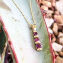 Trilogy Round Cut Rhodalite Bar Set Drop Pendant