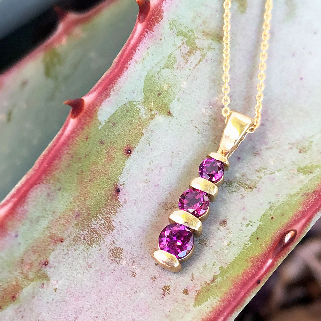 Trilogy Round Cut Rhodalite Bar Set Drop Pendant