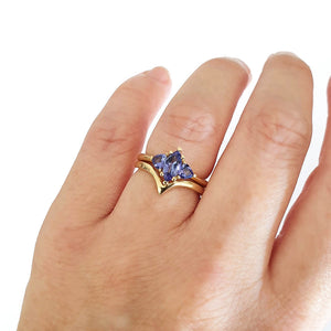 Trilogy Tanzanite Engagement Ring and V Shaped Wedding Band