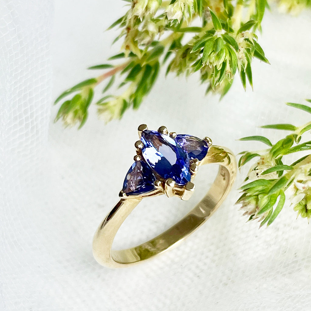 Trilogy Tanzanite Engagement Ring and V Shaped Wedding Band