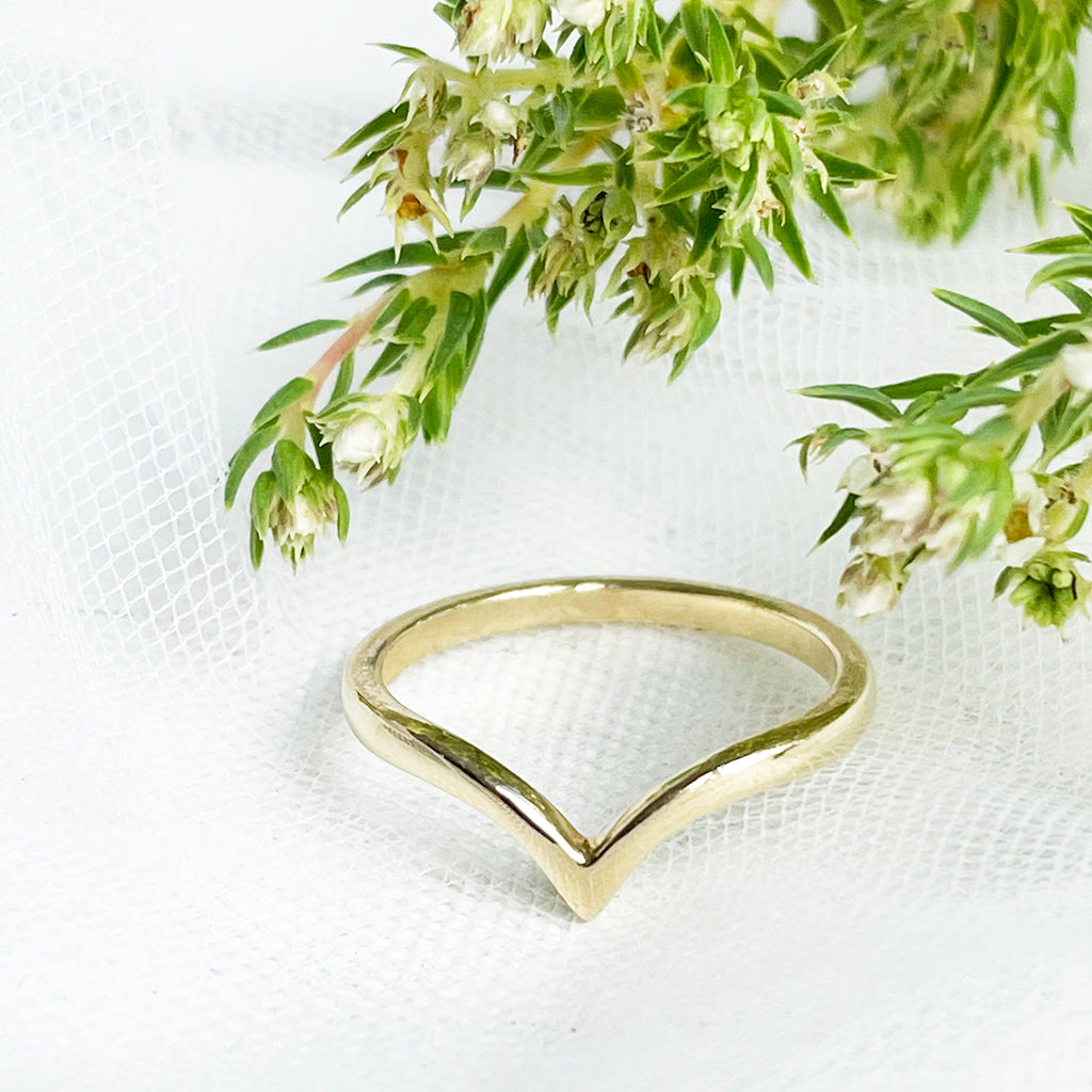 Trilogy Tanzanite Engagement Ring and V Shaped Wedding Band