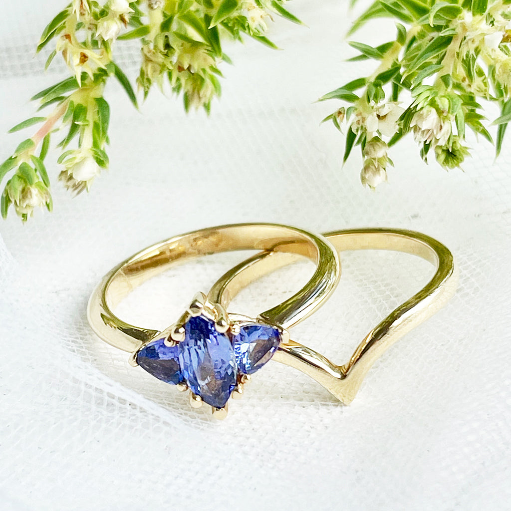 Trilogy Tanzanite Engagement Ring and V Shaped Wedding Band