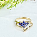 Trilogy Tanzanite Engagement Ring and V Shaped Wedding Band