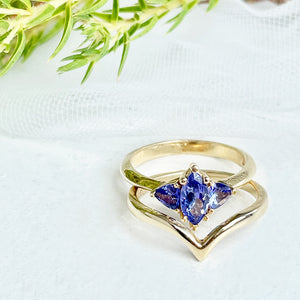 Trilogy Tanzanite Engagement Ring and V Shaped Wedding Band