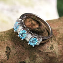 Triple Oval Cut Blue Topaz With Double Diamond Accents