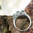 Triple Oval Cut Blue Topaz With Double Diamond Accents