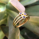 Triple Tanzanite Split Shank Yellow Gold