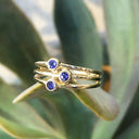 Triple Tanzanite Split Shank Yellow Gold