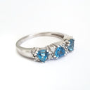 Triple Trilliant Cut Blue Topaz With Double Diamond Accents