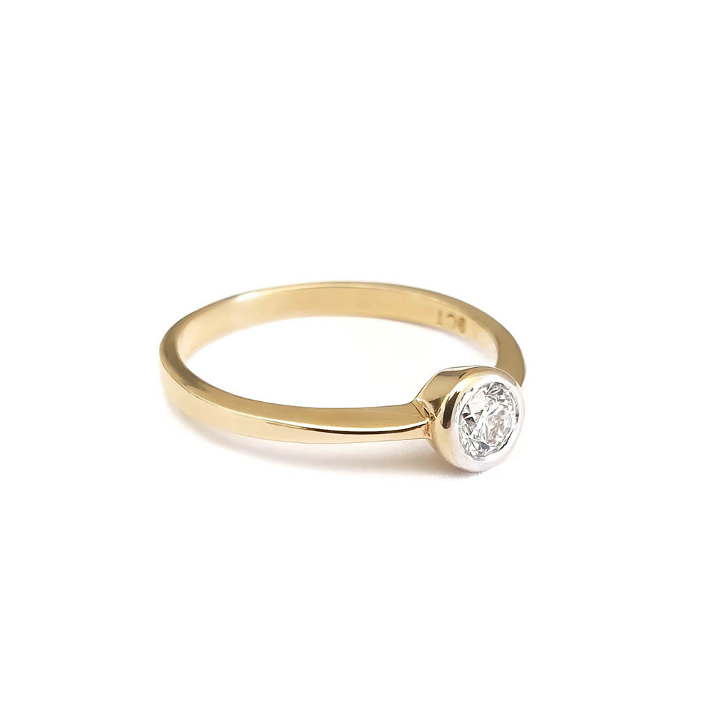 Tube Set Diamond Solitaire Engagement Ring in Yellow Gold
