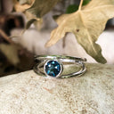 Tube Set Solitaire London Blue Topaz Set in a White Gold Split Shank Ring
