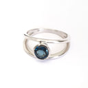 Tube Set Solitaire London Blue Topaz Set in a White Gold Split Shank Ring