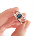 Tube Set Solitaire London Blue Topaz Set in a White Gold Split Shank Ring
