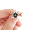 Tube Set Solitaire London Blue Topaz Set in a White Gold Split Shank Ring