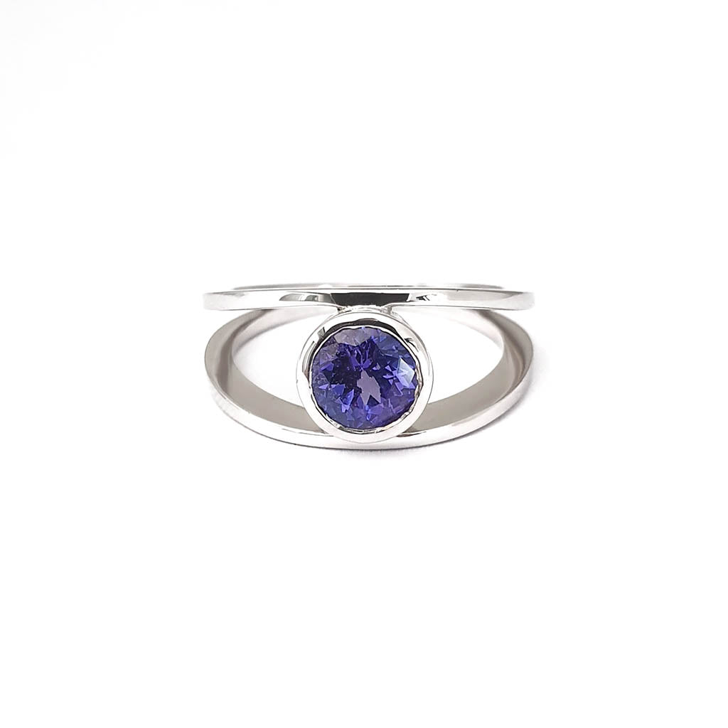 Tube Set Solitaire Tanzanite Set in a White Gold Split Shank Ring