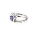 Tube Set Solitaire Tanzanite Set in a White Gold Split Shank Ring