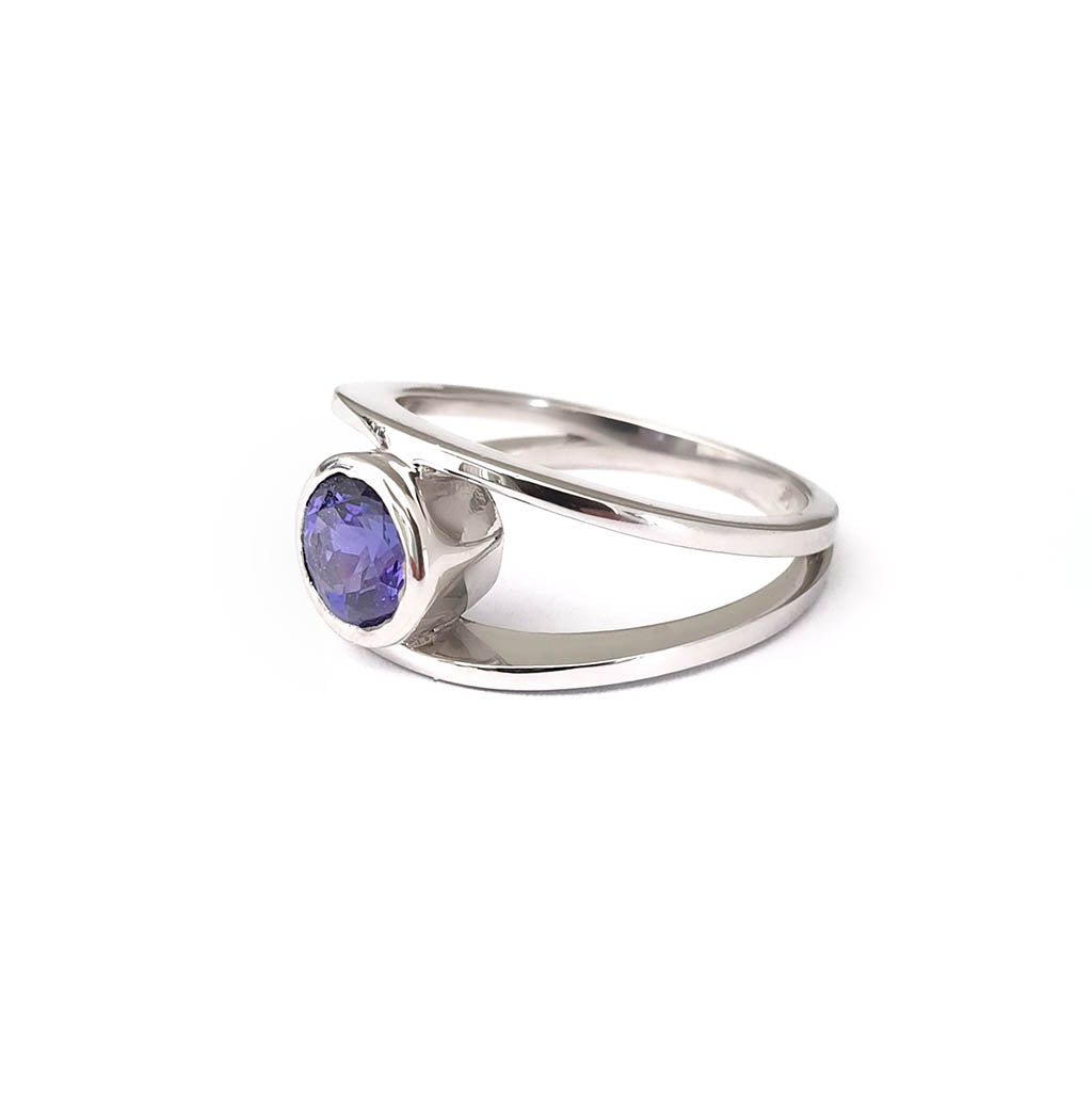Tube Set Solitaire Tanzanite Set in a White Gold Split Shank Ring
