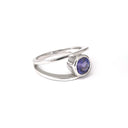 Tube Set Solitaire Tanzanite Set in a White Gold Split Shank Ring