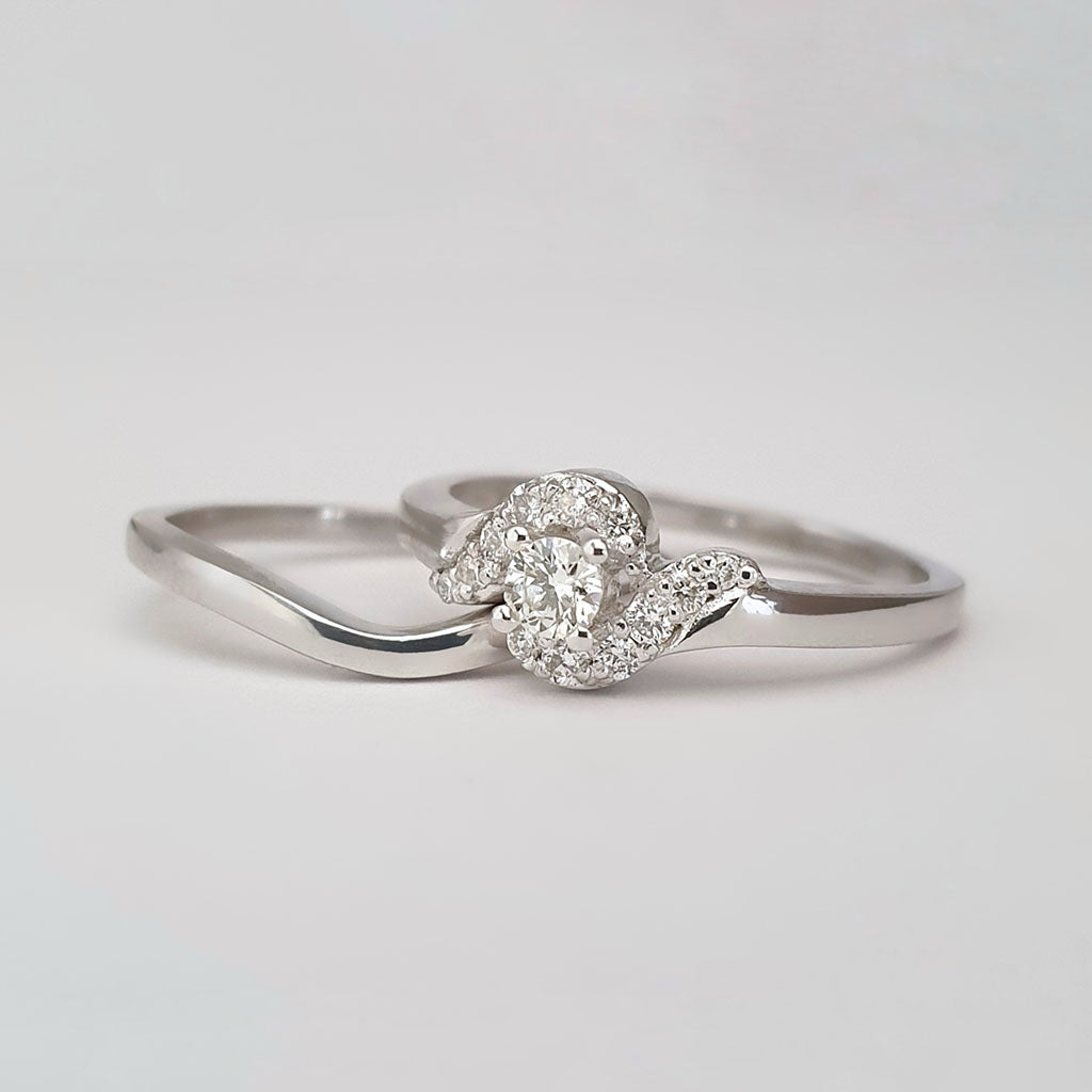 Twisted Shoulder Diamond Encrusted Engagement Ring and White Gold Wedding Set