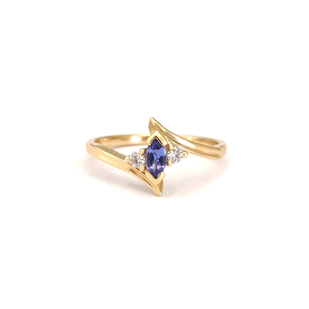 Unique Marquise Cut Tanzanite and Diamond Swish Yellow Gold Ring