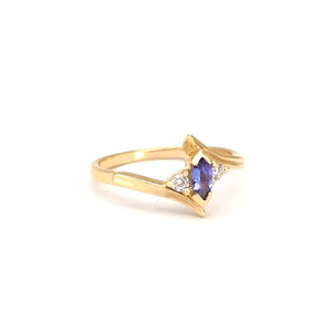 Unique Marquise Cut Tanzanite and Diamond Swish Yellow Gold Ring