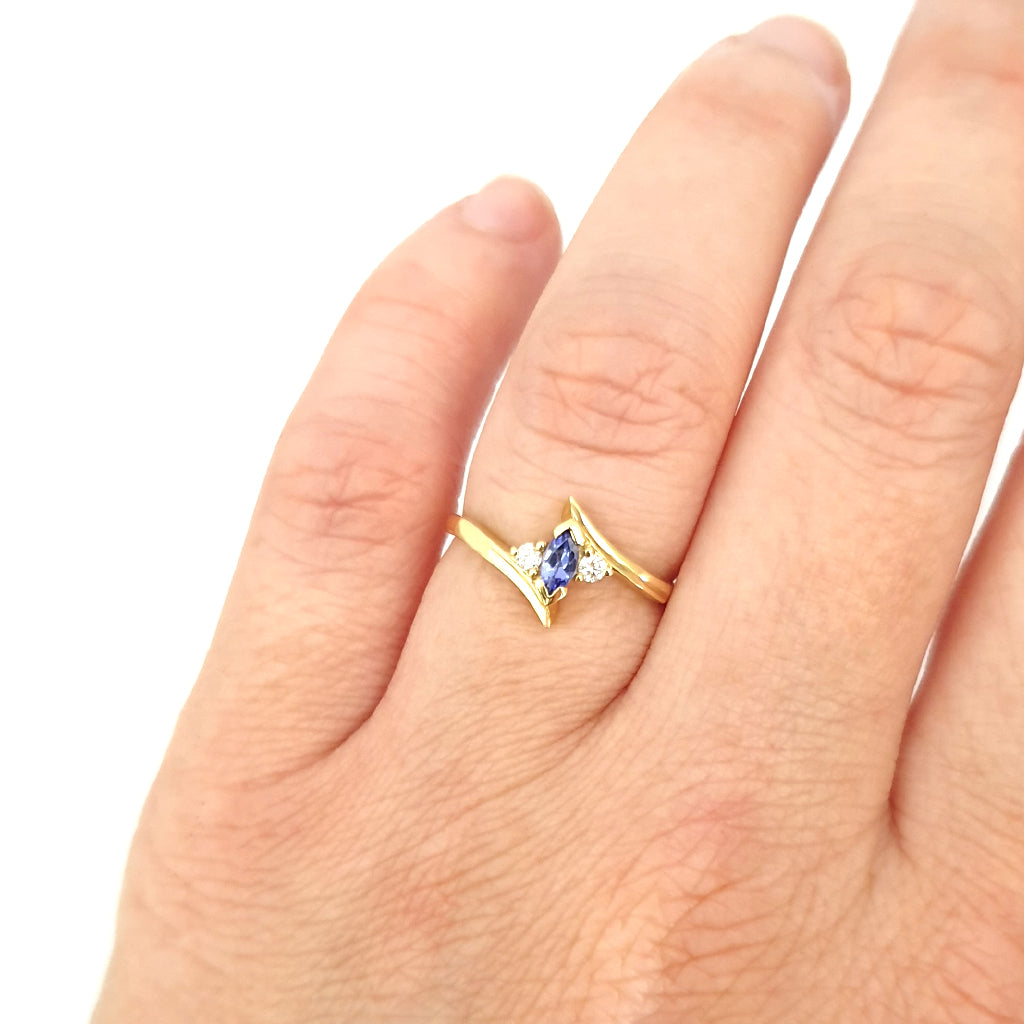 Unique Marquise Cut Tanzanite and Diamond Swish Yellow Gold Ring