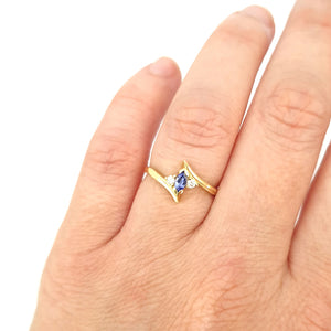 Unique Marquise Cut Tanzanite and Diamond Swish Yellow Gold Ring