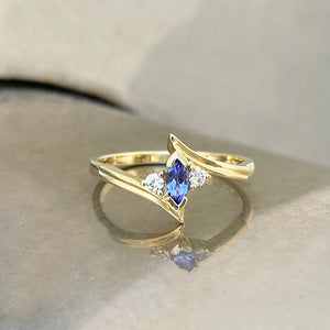 Unique Marquise Cut Tanzanite and Diamond Swish Yellow Gold Ring